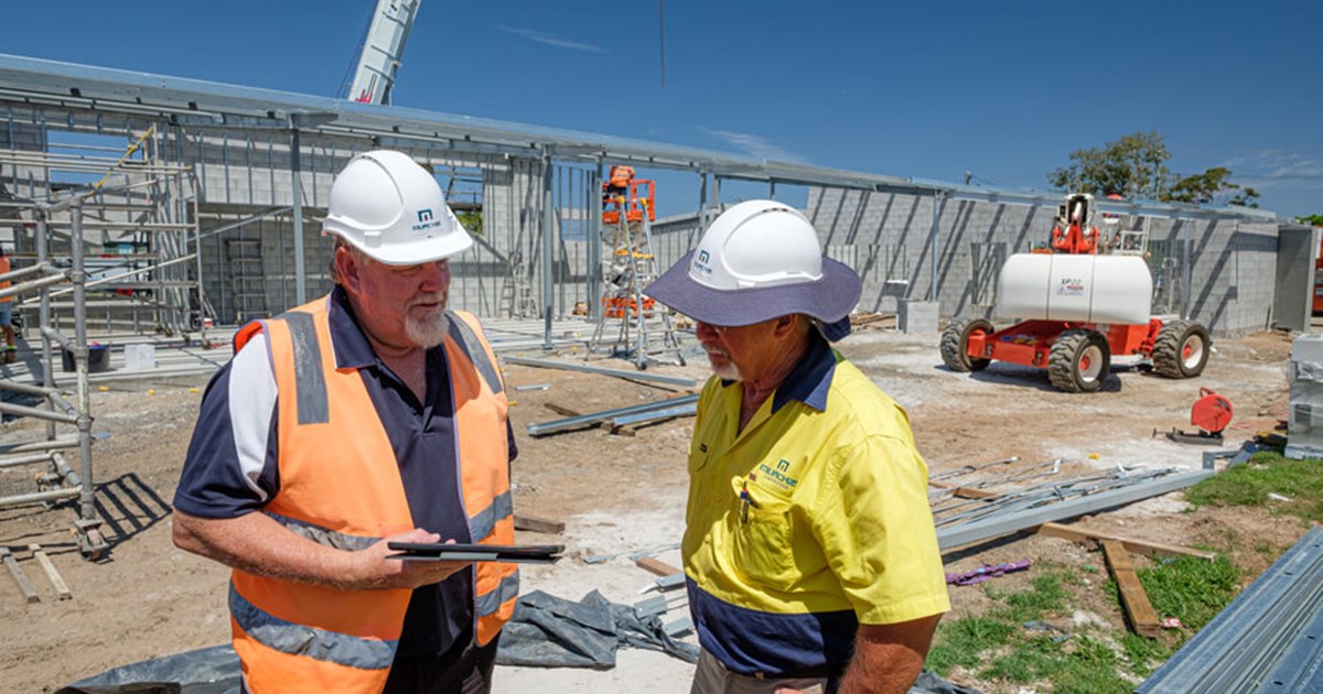 Two Project Managers On Building Site